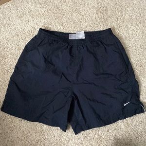 Black athletic nike shorts.